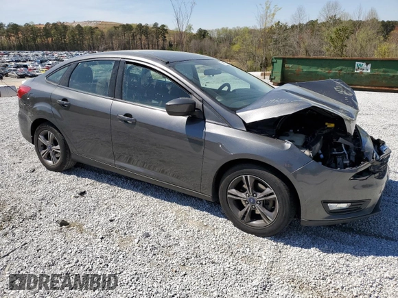 2018 Ford Focus SE with VIN 1FADP3FE9JL278340, listed as a Copart auction lot 50839345 with 83,187 mi miles and Salvage title. Bid and sale history available at DreamBid. Image 4.