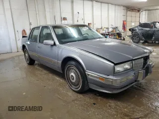 1991 Cadillac Seville z VIN 1G6KS53B2MU809384, wystawiony jako Copart lot #77185134 z przebiegiem 134 769 mil mil oraz Szkody całkowita. Historia ofert i sprzedaży dostępna na DreamBid. Obrazek 4.