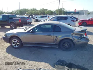 2001 Ford Mustang Standard with VIN 1FAFP40461F264327, listed as a IAAI auction lot 42002990 with 316,107 mi miles. Bid and sale history available at carsss.com. Image 13.