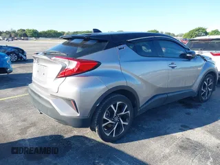 2019 Toyota C-HR XLE with VIN NMTKHMBX4KR082574, listed as a IAAI auction lot 41694921 with 61,777 mi miles and . Bid and sale history available at DreamBid. Image 4.