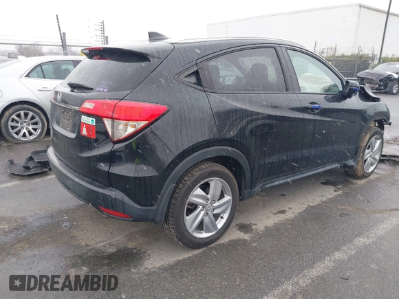 2019 Honda HR-V EX with VIN 3CZRU5H52KM704011, listed as a IAAI auction lot 41616517 with 57,921 mi miles. Bid and sale history available at carsss.com. Image 4.