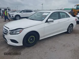 2014 Mercedes-Benz E 350 Sport with VIN WDDHF5KBXEB044358, listed as a IAAI auction lot 42048899 with 115,971 mi miles and . Bid and sale history available at DreamBid. Image 2.