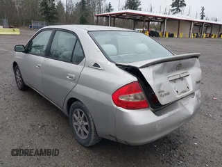 2003 Toyota Prius with VIN JT2BK18U030072183, listed as a IAAI auction lot 41260964 with 291,451 mi miles. Bid and sale history available at carsss.com. Image 3.