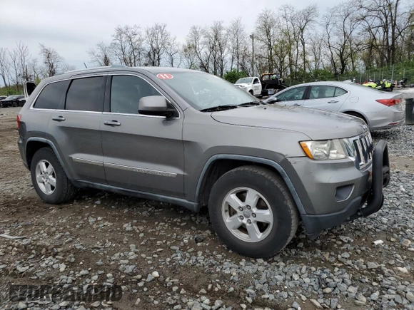 2011 Jeep Grand Cherokee Laredo with VIN 1J4RR4GG7BC578129, listed as a Copart auction lot 53147775 with 157,127 mi miles and Salvage title. Bid and sale history available at DreamBid. Image 4.
