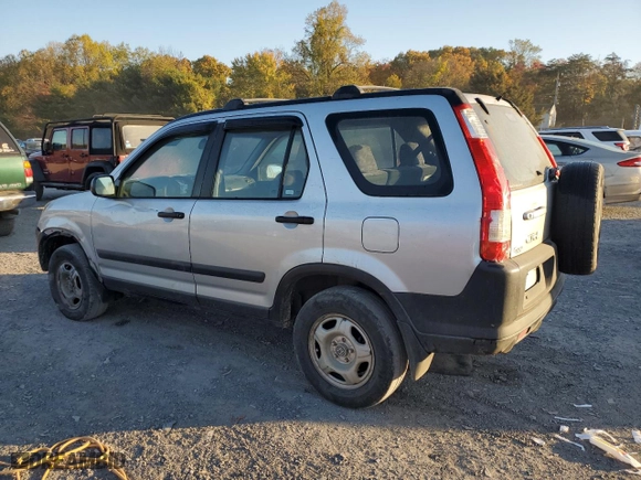 2003 Honda CR-V LX with VIN SHSRD78563U130786, listed as a Copart auction lot 77021604 with 208,065 mi miles and Salvage Title. Bid and sale history available at carsss.com. Image 2.