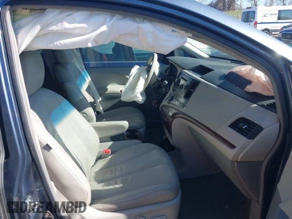 2014 Toyota Sienna XLE with VIN 5TDYK3DC2ES500586, listed as a IAAI auction lot 41995867 with 148,861 mi miles and . Bid and sale history available at DreamBid. Image 5.