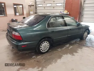 1997 Honda Accord EX with VIN 1HGCD5651VA013487, listed as a IAAI auction lot 42119812 with 231,731 mi miles and . Bid and sale history available at DreamBid. Image 4.