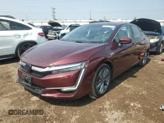 2018 Honda Clarity Touring z VIN JHMZC5F30JC023967, wystawiony jako Copart lot #59873715 z przebiegiem 69 487 mil mil oraz Szkoda całkowita • Salvage title. Historia ofert i sprzedaży dostępna na DreamBid. Obrazek 1.