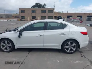 2014 Acura ILX with VIN 19VDE1F34EE000679, listed as a IAAI auction lot 41799014 with 136,514 mi miles. Bid and sale history available at carsss.com. Image 14.