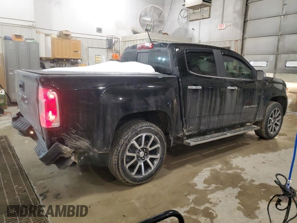 2022 GMC Canyon 4WD Denali with VIN 1GTG6EEN5N1112356, listed as a Copart auction lot 87871435 with 25,352 mi miles and Salvage Title. Bid and sale history available at carsss.com. Image 3.