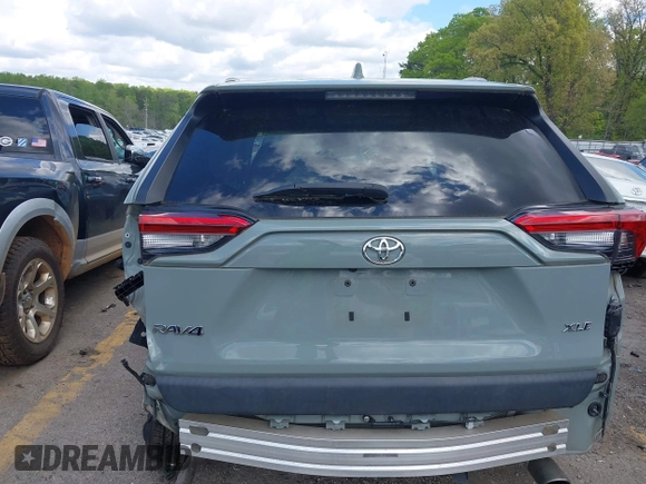 2019 Toyota RAV4 XLE with VIN 2T3W1RFV3KW056351, listed as a IAAI auction lot 42011662 with 64,634 mi miles. Bid and sale history available at carsss.com. Image 16.