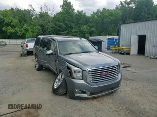 2019 GMC Yukon XL SLT z VIN 1GKS1GKC0KR325305, wystawiony jako Copart lot #56219325 z przebiegiem 136 295 mil mil oraz Szkoda całkowita • Salvage title. Historia ofert i sprzedaży dostępna na DreamBid. Obrazek 14.