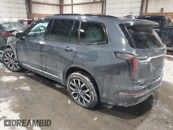 2022 Cadillac XT6 Sport with VIN 1GYKPGRS2NZ164879, listed as a IAAI auction lot 41555242 with 10,862 mi miles. Bid and sale history available at carsss.com. Image 3.