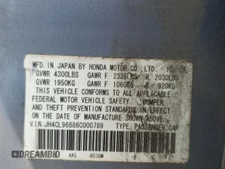 2006 Acura TSX z VIN JH4CL96886C000789, wystawiony jako Copart lot #58255645 z przebiegiem 237 659 mil mil oraz Szkoda całkowita • Salvage title. Historia ofert i sprzedaży dostępna na DreamBid. Obrazek 13.