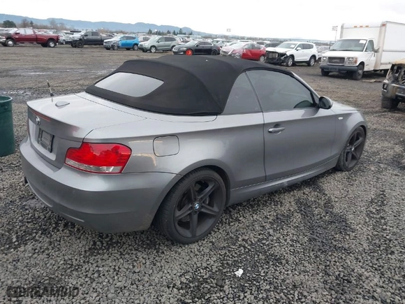 2009 BMW 1 Series 135i with VIN WBAUN93599VK40515, listed as a IAAI auction lot 41144493 with 161,676 mi miles. Bid and sale history available at carsss.com. Image 4.