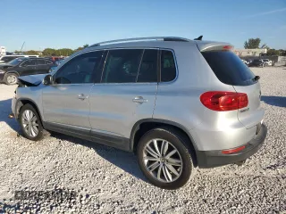 2014 Volkswagen Tiguan SE z VIN WVGAV3AX6EW549608, wystawiony jako Copart lot #48240405 z przebiegiem 81 629 mil mil oraz Szkoda całkowita • Salvage title. Historia ofert i sprzedaży dostępna na DreamBid. Obrazek 2.