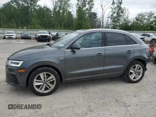 2018 Audi Q3 Premium Plus with VIN WA1JCCFS4JR034035, listed as a Copart auction lot 62052285 with 69,153 mi miles and Salvage title. Bid and sale history available at DreamBid. Image 1.