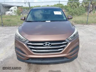 2016 Hyundai Tucson SE with VIN KM8J23A4XGU180300, listed as a IAAI auction lot 42123067 with 123,804 mi miles. Bid and sale history available at carsss.com. Image 12.