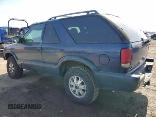 2003 GMC Jimmy z VIN 1GKCT18X43K110056, wystawiony jako Copart lot #48671585 z przebiegiem 272 867 mil mil oraz Czysty tytuł • Clean title. Historia ofert i sprzedaży dostępna na DreamBid. Obrazek 2.