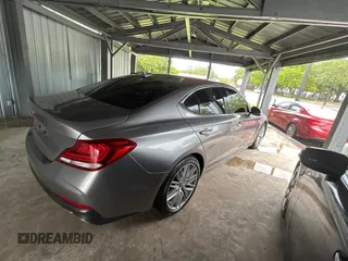 2021 Genesis G70 2.0T z VIN KMTG34LAXMU074866, wystawiony jako Copart lot #56966995 z przebiegiem 54 000 mil mil oraz Tytuł czysty. Historia ofert i sprzedaży dostępna na DreamBid. Obrazek 4.