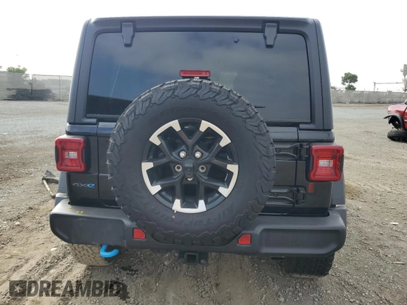 2024 Jeep Wrangler Rubicon z VIN 1C4RJXR6XRW291900, wystawiony jako Copart lot #61682885 z przebiegiem Nie podano mil oraz Szkoda całkowita • Salvage title. Historia ofert i sprzedaży dostępna na DreamBid. Obrazek 6.