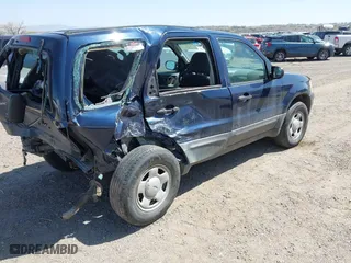 2003 Ford Escape XLS Popular with VIN 1FMYU92143KB89726, listed as a IAAI auction lot 42002613 with 95,586 mi miles. Bid and sale history available at carsss.com. Image 4.