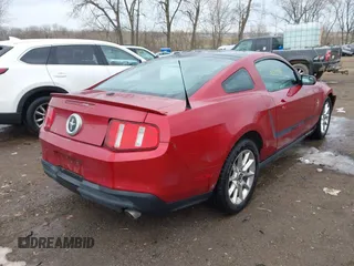 2011 Ford Mustang V6 with VIN 1ZVBP8AM0B5124826, listed as a IAAI auction lot 41639926 with 211,934 mi miles and . Bid and sale history available at carsss.com. Image 4.
