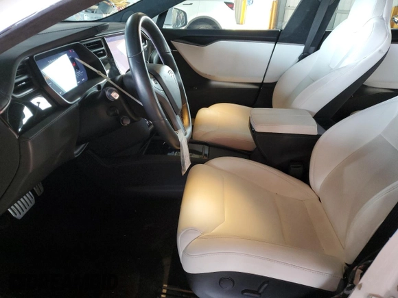 2019 Tesla Model S 100D with VIN 5YJSA1E45KF330633, listed as a Copart auction lot 49329745 with 74,047 mi miles and Salvage title. Bid and sale history available at DreamBid. Image 7.
