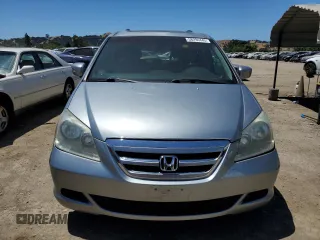 2006 Honda Odyssey EX-L z VIN 5FNRL38756B020403, wystawiony jako Copart lot #58294445 z przebiegiem 248 529 mil mil oraz Szkoda całkowita • Salvage title. Historia ofert i sprzedaży dostępna na DreamBid. Obrazek 5.