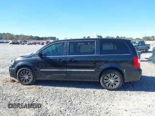 2014 Chrysler Town & Country S with VIN 2C4RC1HGXER225397, listed as a IAAI auction lot 41023867 with 180,093 mi miles and . Bid and sale history available at DreamBid. Image 14.