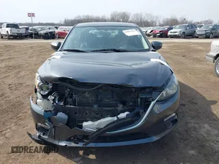 2014 Mazda 3 i Grand Touring with VIN JM1BM1M74E1212699, listed as a IAAI auction lot 41804428 with 195,472 mi miles and . Bid and sale history available at DreamBid. Image 12.
