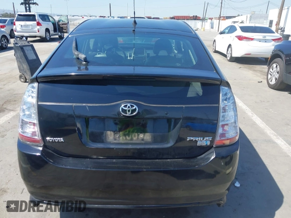 2007 Toyota Prius with VIN JTDKB20UX73228033, listed as a IAAI auction lot 41851668 with 242,138 mi miles. Bid and sale history available at carsss.com. Image 16.