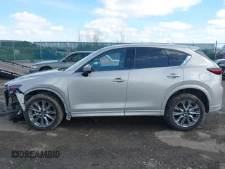 2024 Mazda CX-5 2.5 S Premium Package with VIN JM3KFBDL5R0465272, listed as a IAAI auction lot 41959823 with 12,777 mi miles. Bid and sale history available at carsss.com. Image 14.