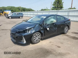 2021 Toyota Prius LE z VIN JTDKAMFP8M3170547, wystawiony jako Copart lot #60262615 z przebiegiem 56 156 mil mil oraz Szkoda całkowita • Salvage title. Historia ofert i sprzedaży dostępna na DreamBid. Obrazek 1.