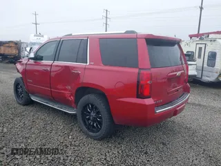 2015 Chevrolet Tahoe LTZ z VIN 1GNSKCKC6FR276531, wystawiony jako IAAI lot #41692617 z przebiegiem 124 010 mil mil oraz . Historia ofert i sprzedaży dostępna na DreamBid. Obrazek 3.