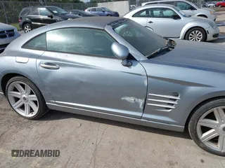 2005 Chrysler Crossfire Limited z VIN 1C3AN69L25X035065, wystawiony jako IAAI lot #41725853 z przebiegiem 64 156 mil mil oraz . Historia ofert i sprzedaży dostępna na DreamBid. Obrazek 6.