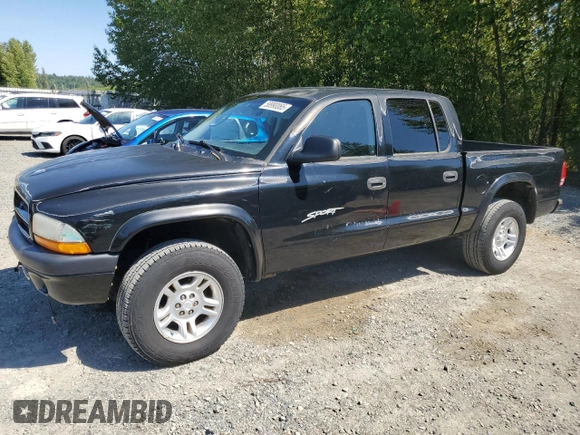 2001 Dodge Dakota Sport z VIN 1B7GG2AN81S113605, wystawiony jako Copart lot #58990065 z przebiegiem 243 919 mil mil oraz Czysty tytuł • Clean title. Historia ofert i sprzedaży dostępna na DreamBid. Obrazek 1.