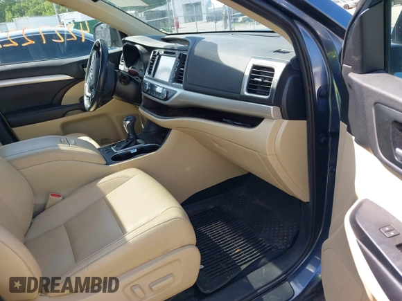 2019 Toyota Highlander SE with VIN 5TDKZRFH1KS290412, listed as a IAAI auction lot 42272229 with 74,212 mi miles and . Bid and sale history available at DreamBid. Image 5.
