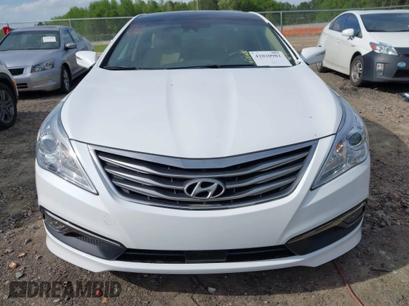 2017 Hyundai Azera Limited with VIN KMHFH4JG8HA591542, listed as a IAAI auction lot 42020982 with 75,174 mi miles and . Bid and sale history available at carsss.com. Image 13.