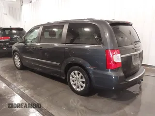 2011 Chrysler Town & Country Touring L with VIN 2A4RR8DG3BR676240, listed as a IAAI auction lot 41980939 with 184,524 mi miles and . Bid and sale history available at DreamBid. Image 3.