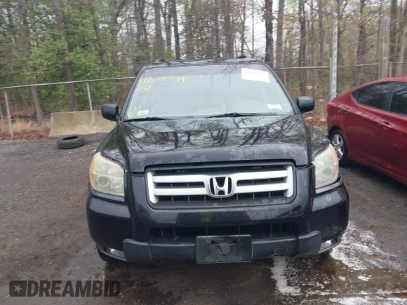 2006 Honda Pilot EX-L with VIN 5FNYF18776B021690, listed as a IAAI auction lot 42016219 with 239,666 mi miles and . Bid and sale history available at DreamBid. Image 12.