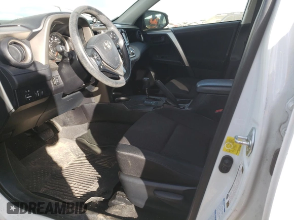 2014 Toyota RAV4 LE with VIN JTMBFREV0EJ009007, listed as a Copart auction lot 77417724 with 128,543 mi miles and Salvage Title. Bid and sale history available at DreamBid. Image 7.