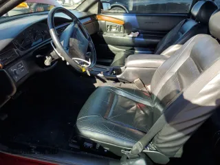 1999 Cadillac Eldorado Touring z VIN 1G6ET1293XU611368, wystawiony jako Copart lot #82683114 z przebiegiem 126 178 mil mil oraz Szkody całkowita. Historia ofert i sprzedaży dostępna na DreamBid. Obrazek 7.