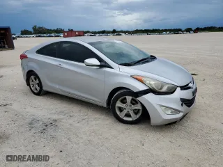 2013 Hyundai Elantra Coupe GS PZEV with VIN KMHDH6AE5DU003333, listed as a Copart auction lot 69174074 with 128,797 mi miles and Salvage Title. Bid and sale history available at carsss.com. Image 4.