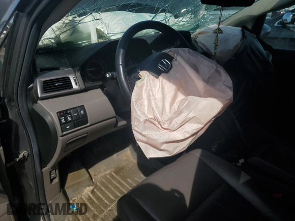 2014 Honda Odyssey EX-L with VIN 5FNRL5H61EB046093, listed as a Copart auction lot 61930335 with Not provided miles and Salvage title. Bid and sale history available at DreamBid. Image 8.