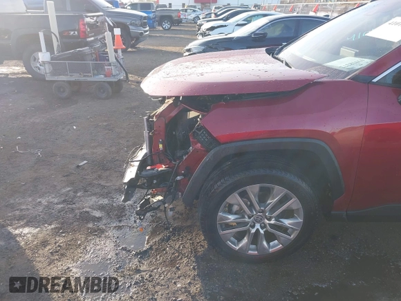 2021 Toyota RAV4 XLE Premium with VIN 2T3C1RFV1MW145048, listed as a IAAI auction lot 41018272 with 61,959 mi miles and . Bid and sale history available at DreamBid. Image 18.