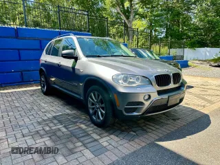 2012 BMW X5 35i with VIN 5UXZV4C55CL986439, listed as a Copart auction lot 63034725 with 188,238 mi miles and Clean title. Bid and sale history available at DreamBid. Image 1.