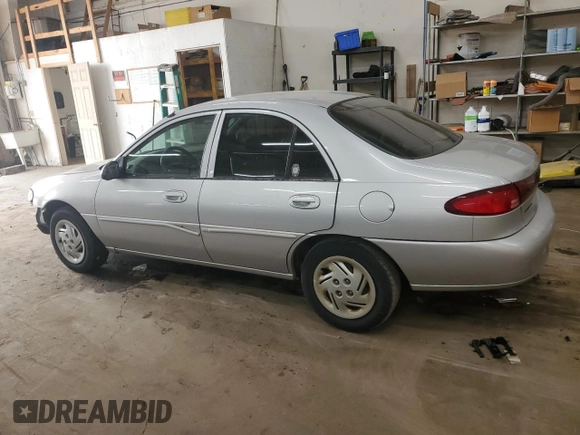 2002 Ford Escort Fleet Standard with VIN 3FAFP13P82R144456, listed as a Copart auction lot 58832935 with 124,502 mi miles and Salvage title. Bid and sale history available at DreamBid. Image 2.