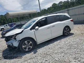 2020 Honda Odyssey Touring с VIN 5FNRL6H8XLB017129, выставлен на аукционе Copart как лот 60205835 с пробегом Не указан миль и Списание • Salvage title. История ставок и продаж доступна на DreamBid. Изображение 1.