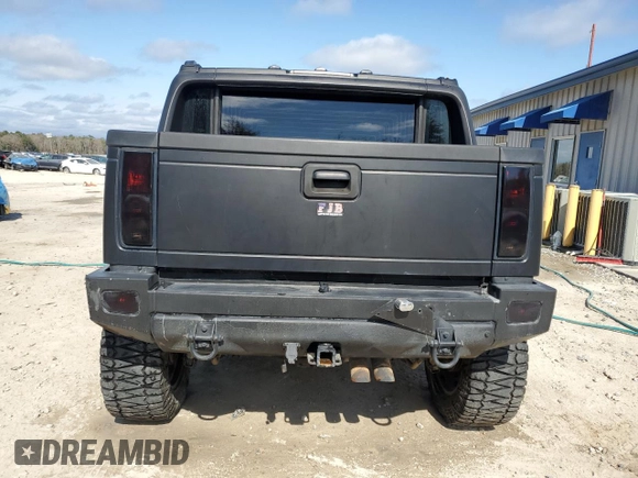 2006 Hummer H2 with VIN 5GRGN22U66H103993, listed as a Copart auction lot 43973375 with 145,565 mi miles and Salvage Title. Bid and sale history available at carsss.com. Image 6.